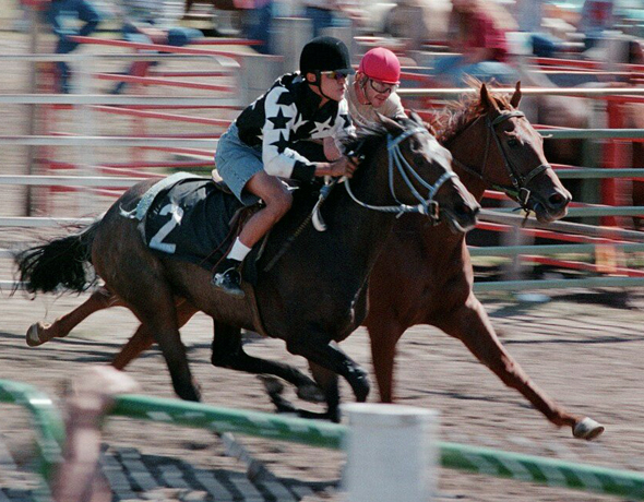 Two relay riders at the county fair.