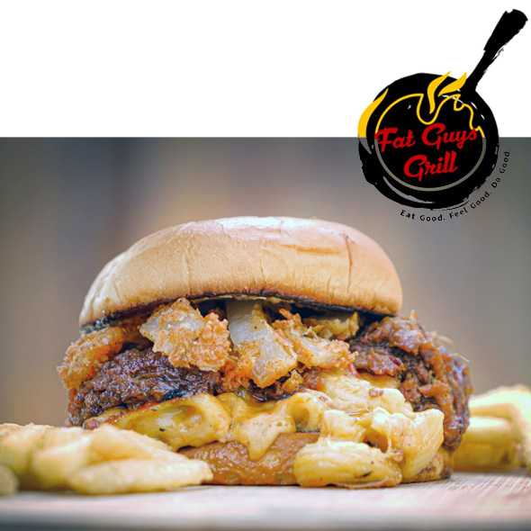 Fat Guys Pork and Mac Stack. BBQ pulled pork, Mac & Cheese patty on toasted bun, topped with signature onion fries.